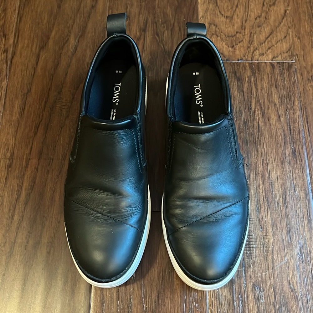 Tom’s black platform slip on- faux leather​